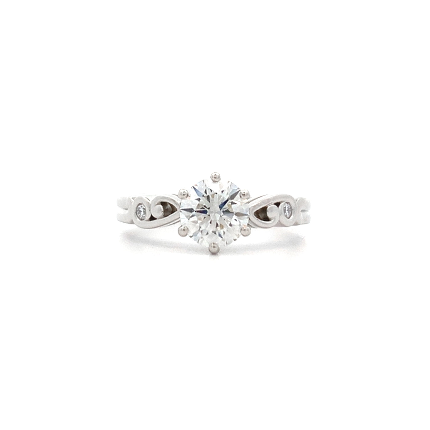 Furl: Brilliant Cut Diamond Solitaire Ring in Platinum | 0.90ct