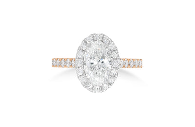 Adorn: Oval Cut Diamond Halo Ring with Diamond Set Band in Rose Gold and Platinum