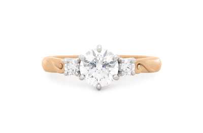 Awa: Brilliant Cut Diamond Three Stone Ring in Rose Gold and Platinum