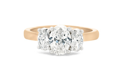 Harmony Oval cut diamond three stone ring in platinum