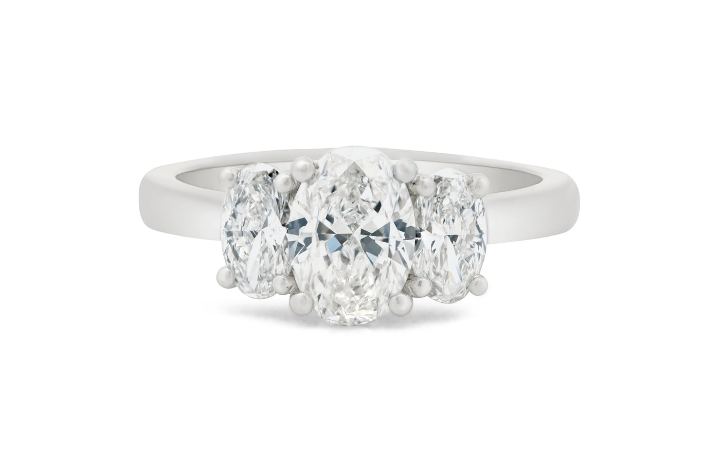 Harmony: Oval Cut Diamond Three Stone Ring in White Gold or Platinum