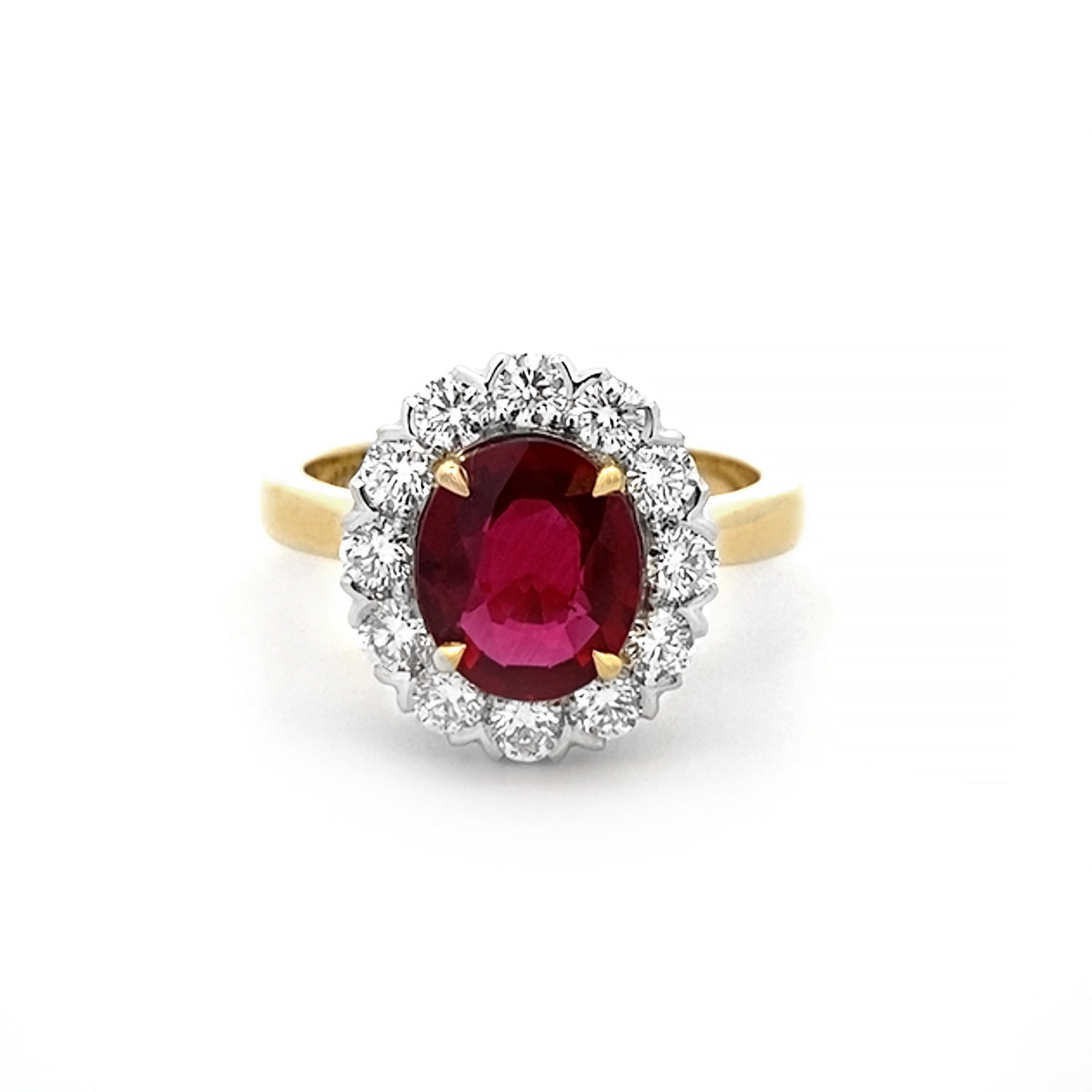 Ruby and diamond halo on sale ring